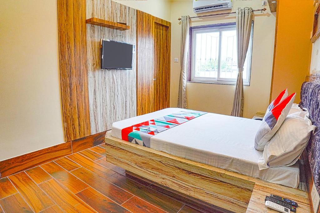 TV a/nebo společenská místnost v ubytování FabHotel Quest - Nr Quest Mall