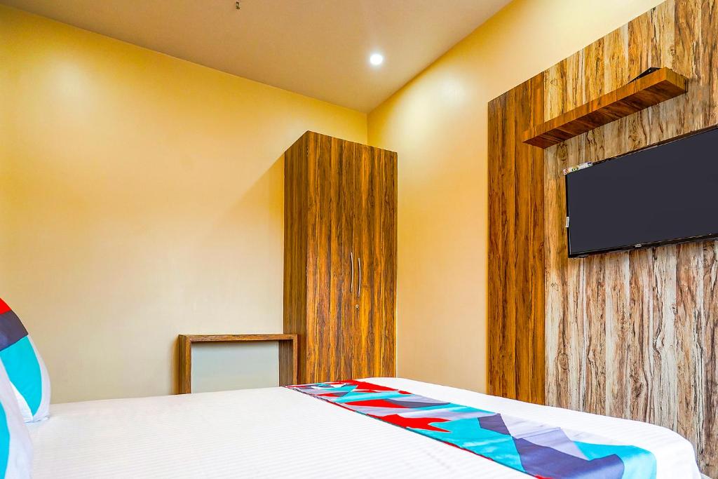 TV a/nebo společenská místnost v ubytování FabHotel Quest - Nr Quest Mall