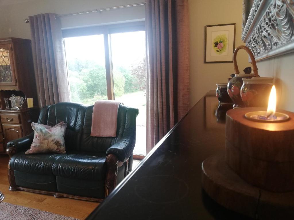 Posezení v ubytování O'Sheas Ceol Na Habhann B&B