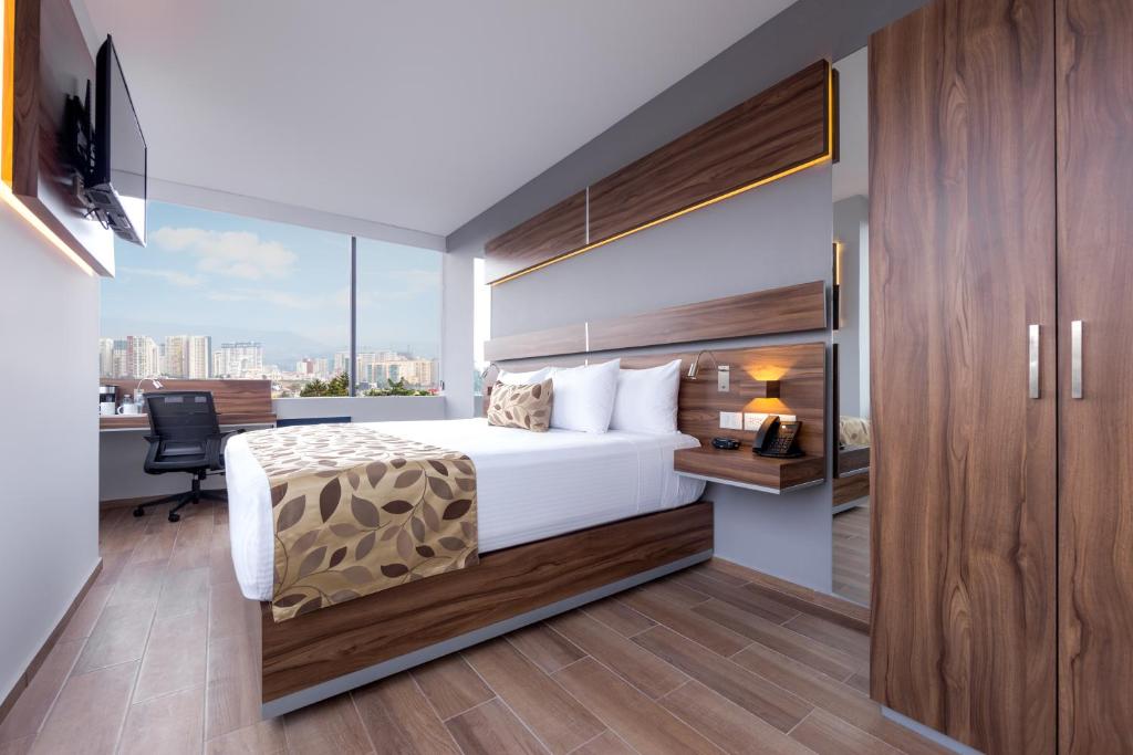 Postel nebo postele na pokoji v ubytování Sleep Inn Ciudad de Mexico Cuajimalpa