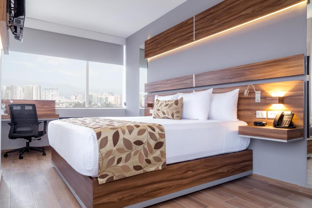Postel nebo postele na pokoji v ubytování Sleep Inn Ciudad de Mexico Cuajimalpa