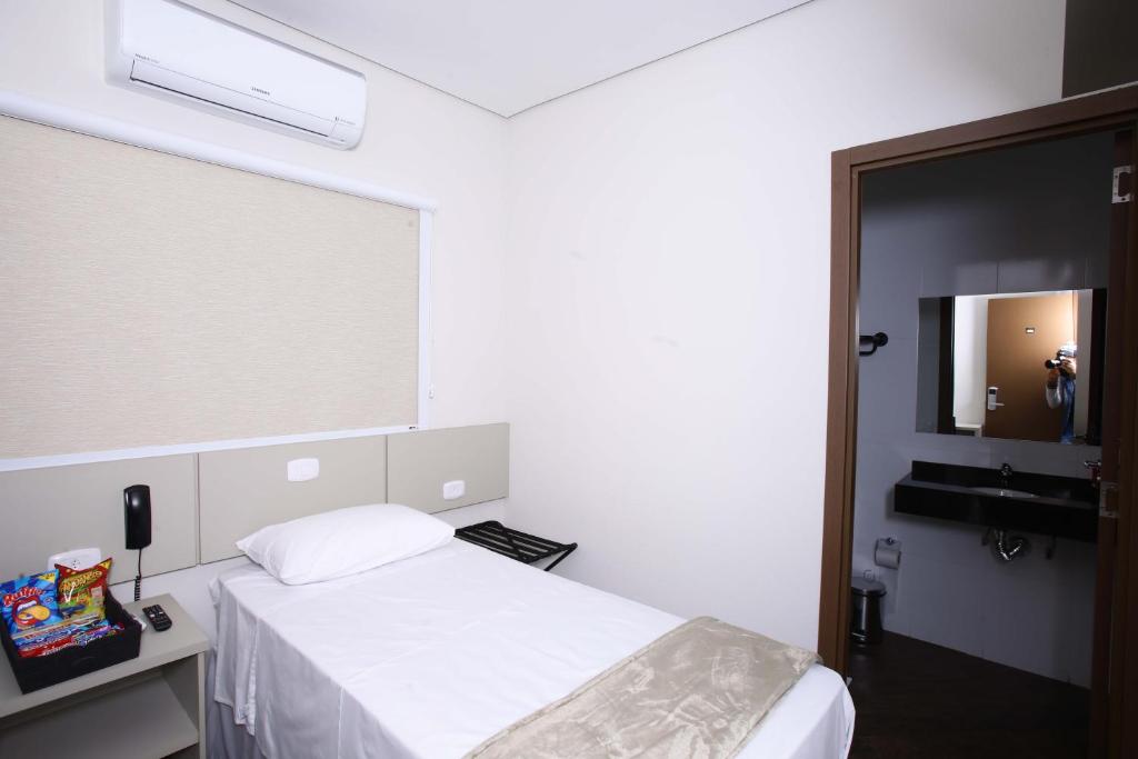 Postel nebo postele na pokoji v ubytování Hotel Pro Tork Confort