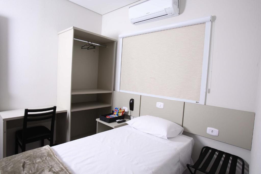 Postel nebo postele na pokoji v ubytování Hotel Pro Tork Confort