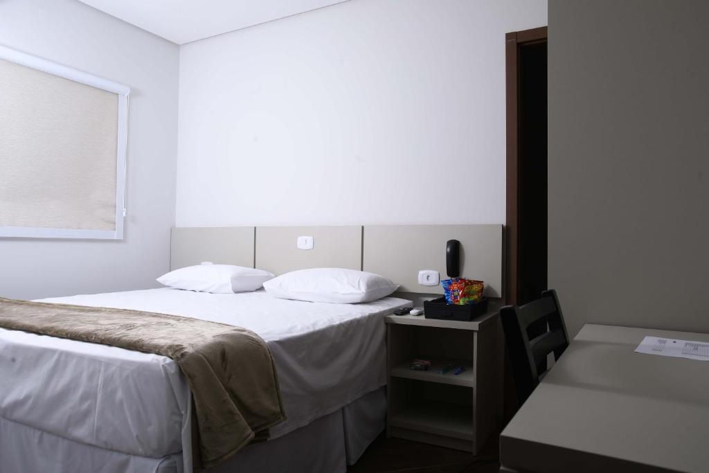 Postel nebo postele na pokoji v ubytování Hotel Pro Tork Confort