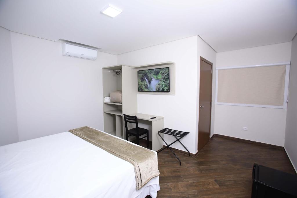 Postel nebo postele na pokoji v ubytování Hotel Pro Tork Confort