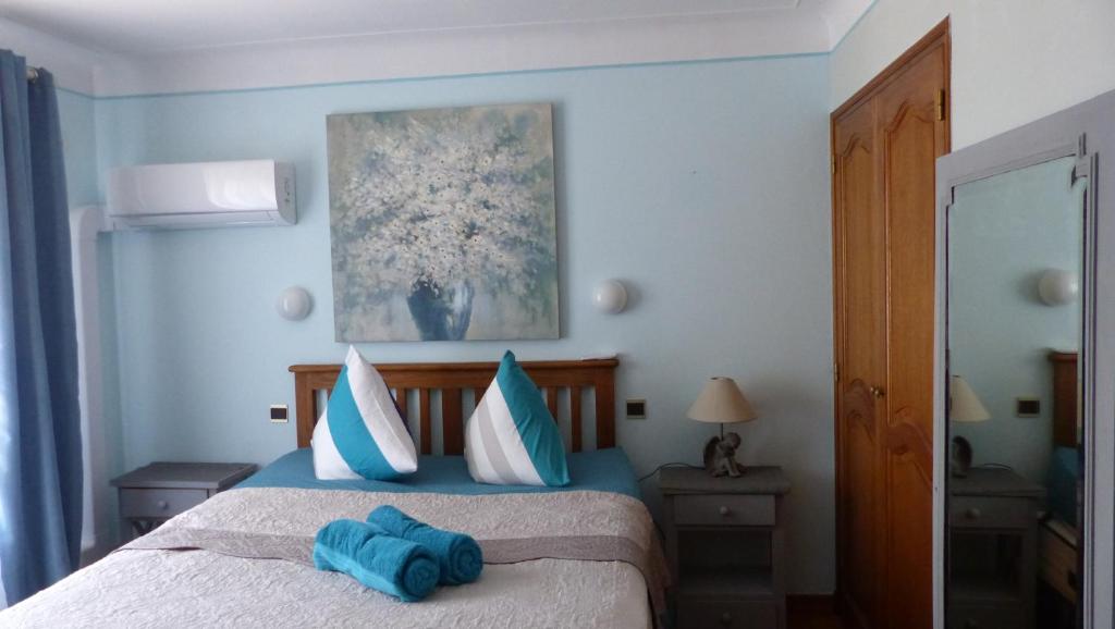 Giường trong phòng chung tại Appartement Stade Aime Giral
