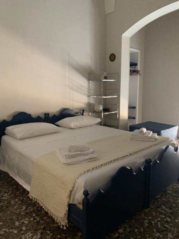 Postel nebo postele na pokoji v ubytování Le Tre Civette