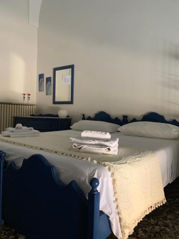 Postel nebo postele na pokoji v ubytování Le Tre Civette