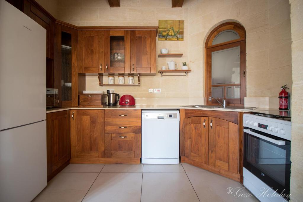 Kuchyň nebo kuchyňský kout v ubytování Mandolina Casa
