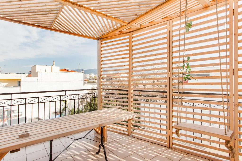 A balcony or terrace at Σοφίτα Μοναδικής Αύρας με Θέα & BBQ