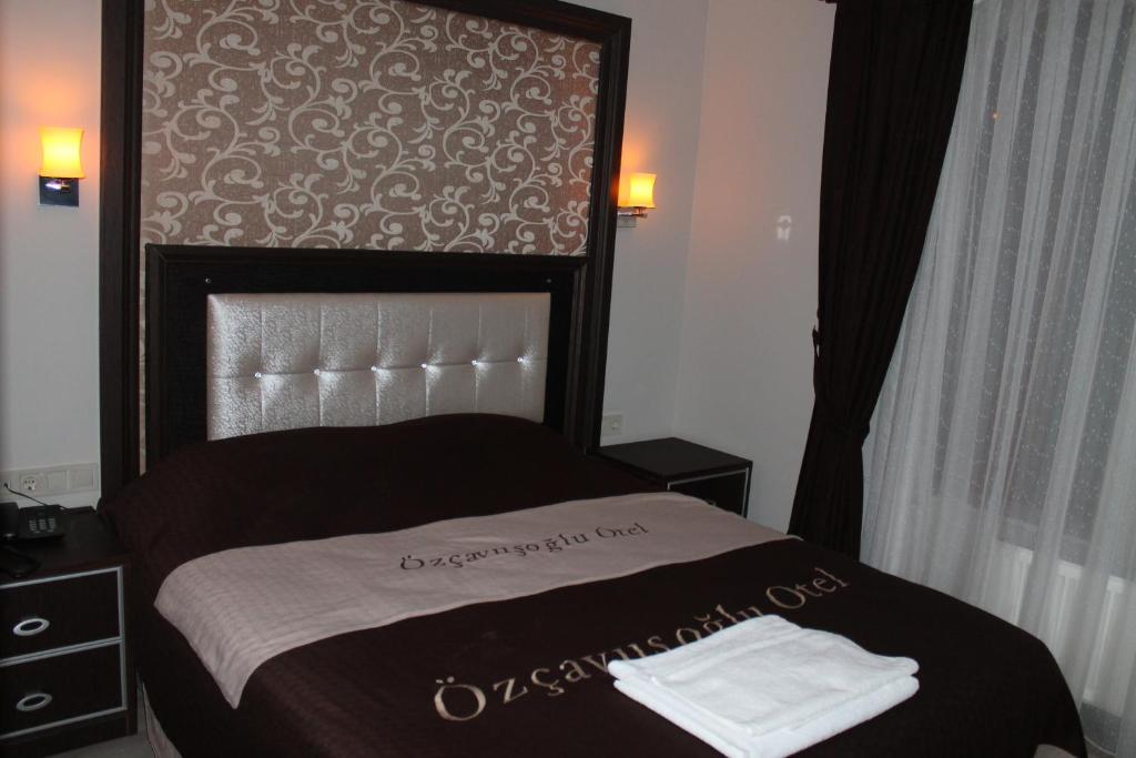 Postel nebo postele na pokoji v ubytování Oz Cavusoglu Hotel