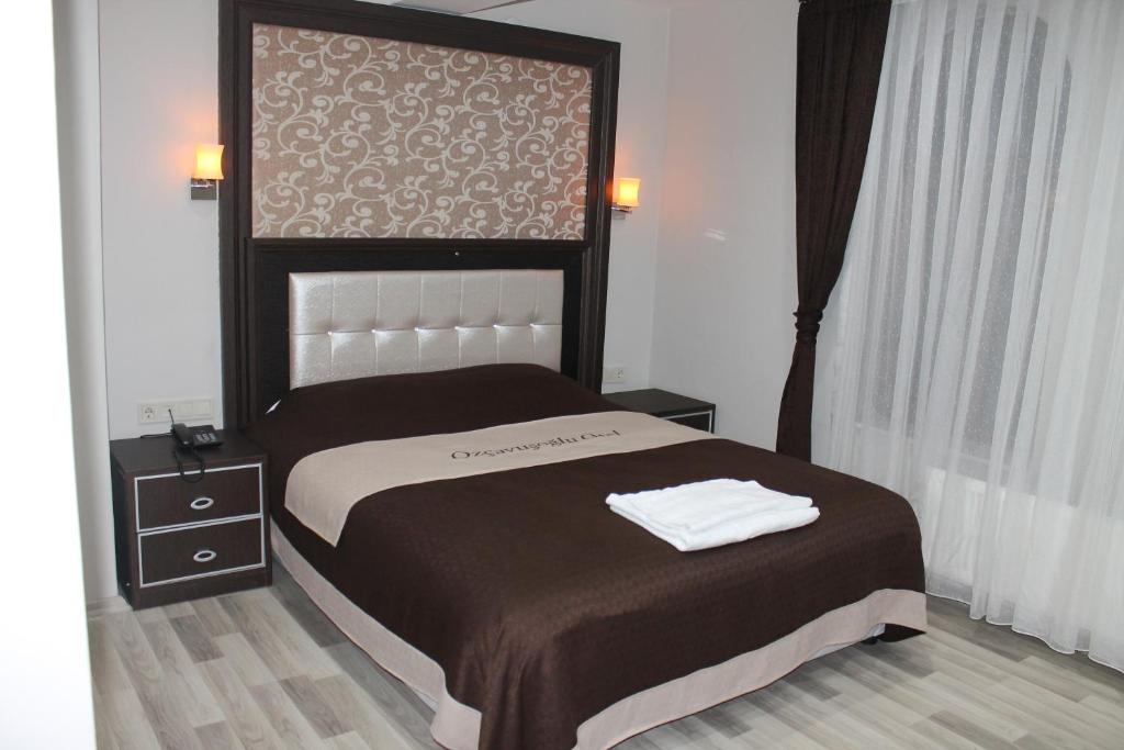 Postel nebo postele na pokoji v ubytování Oz Cavusoglu Hotel