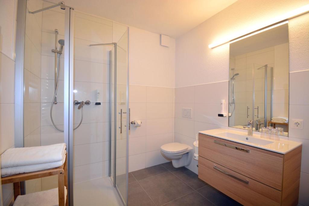 Koupelna v ubytování Landhotel Post Ebensee am Traunsee ***S