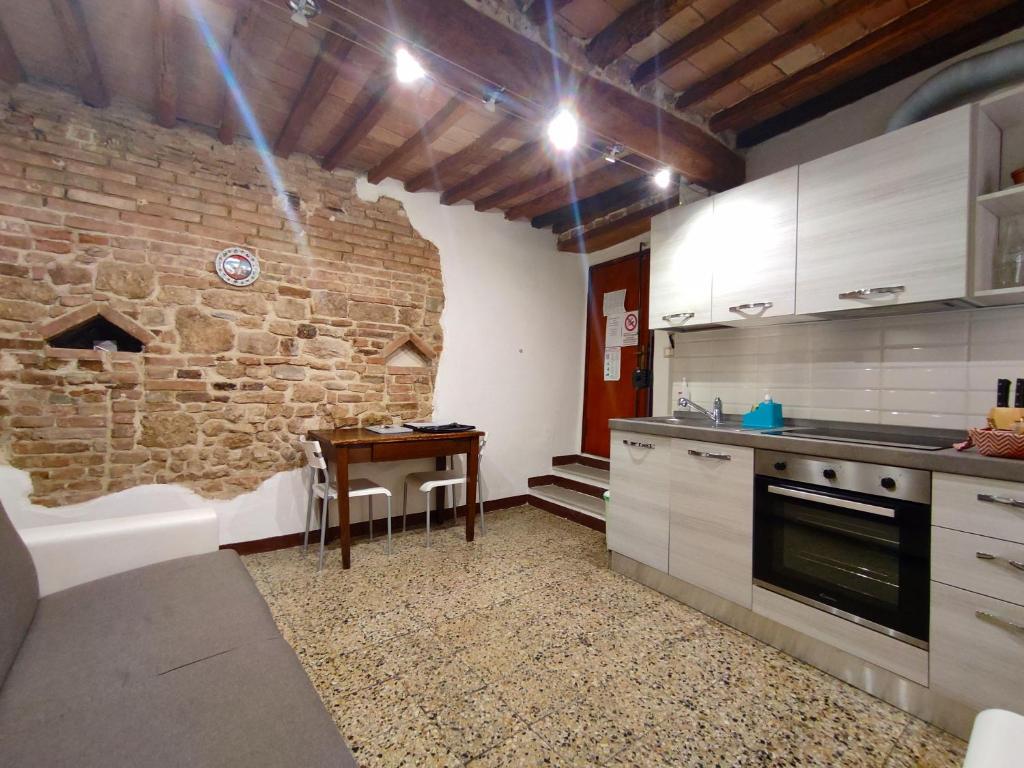 Kuchyň nebo kuchyňský kout v ubytování Casa Vicolo delle Chiavi
