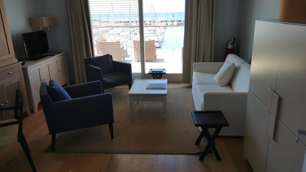 A seating area at Appartamenti Vacanze Marina di Scarlino