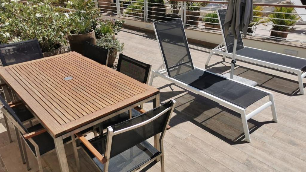 A balcony or terrace at Appartamenti Vacanze Marina di Scarlino