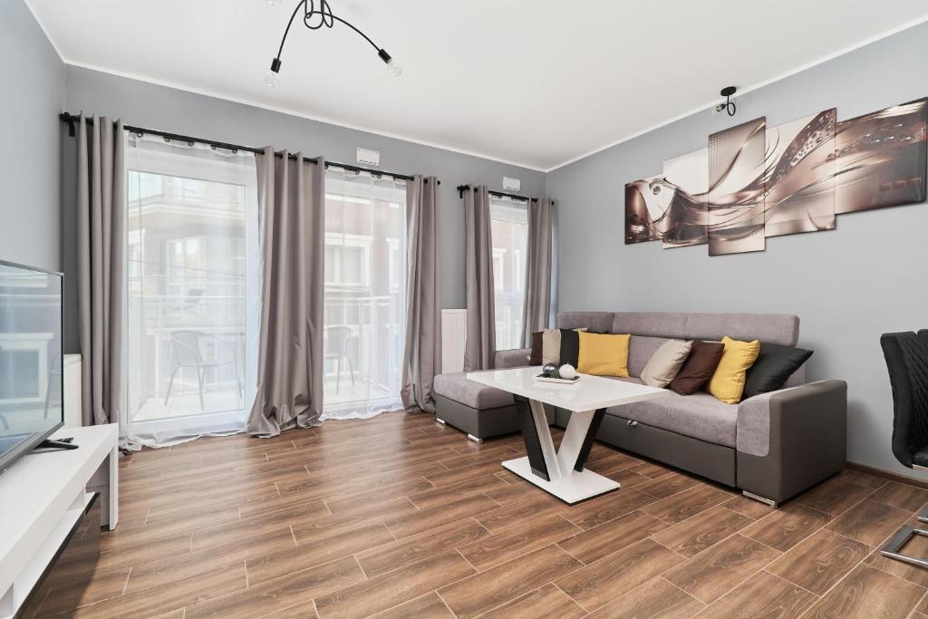 Część wypoczynkowa w obiekcie Apartments Wrocław Jana Pawła II with FREE PARKING Wrocław by Noclegi Renters