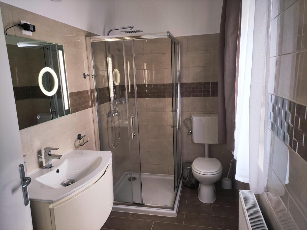 Koupelna v ubytování Zsanett Appartement