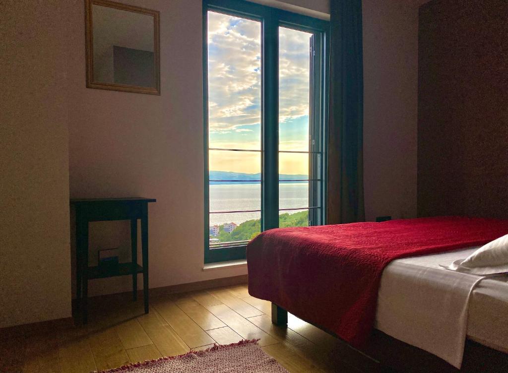 Posteľ alebo postele v izbe v ubytovaní Villa FORTE-Exclusive location with fantastic seaview & infinity pool - up to 8 Pax