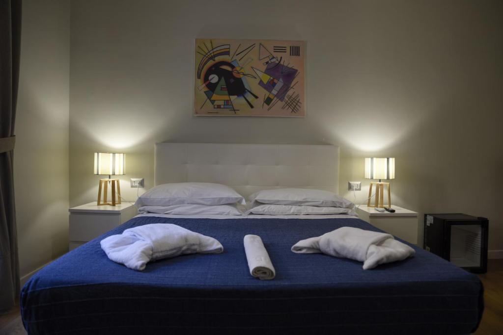 Llit o llits en una habitació de The Castle Inside Rome