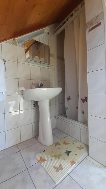 Kúpeľňa v ubytovaní Pátri Apartmanház