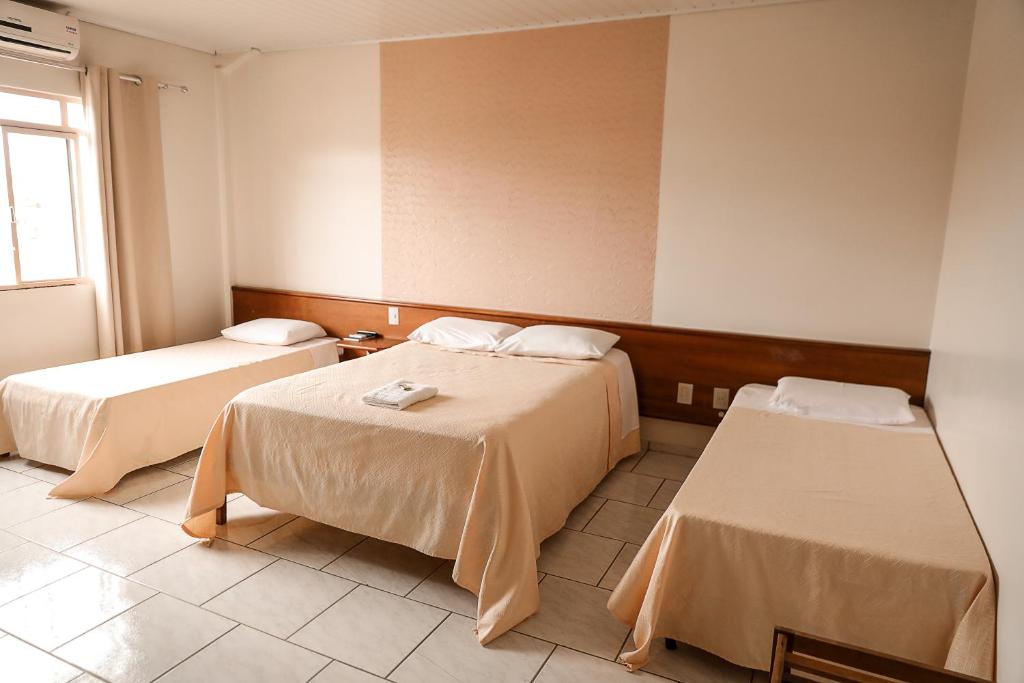 Postel nebo postele na pokoji v ubytování Hotel Antares