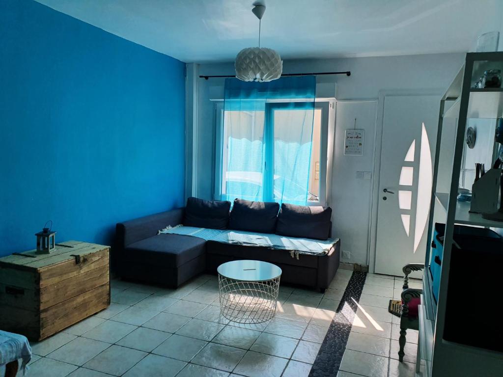 En eller flere senge i et værelse på RACINES MARINES