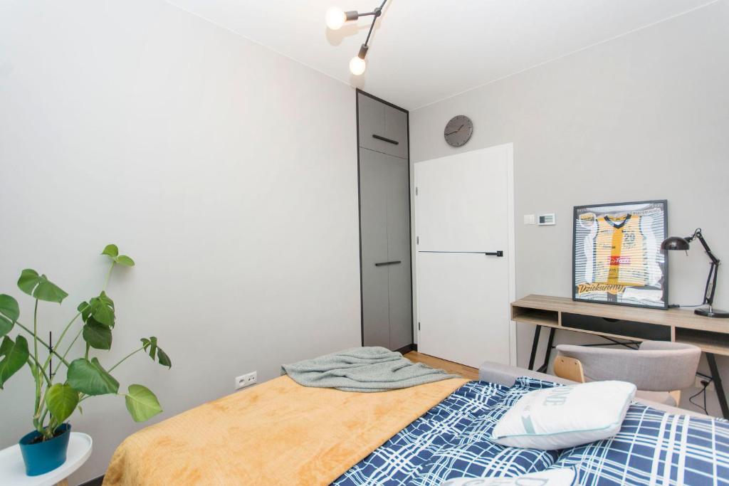 Postel nebo postele na pokoji v ubytování Apartament Rodzinny Portova