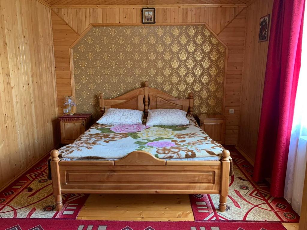 Postel nebo postele na pokoji v ubytování Приватна садиба Яблуневий сад 1