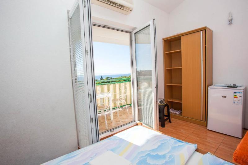 Posteľ alebo postele v izbe v ubytovaní The best location in Makarska,free P, option bikes