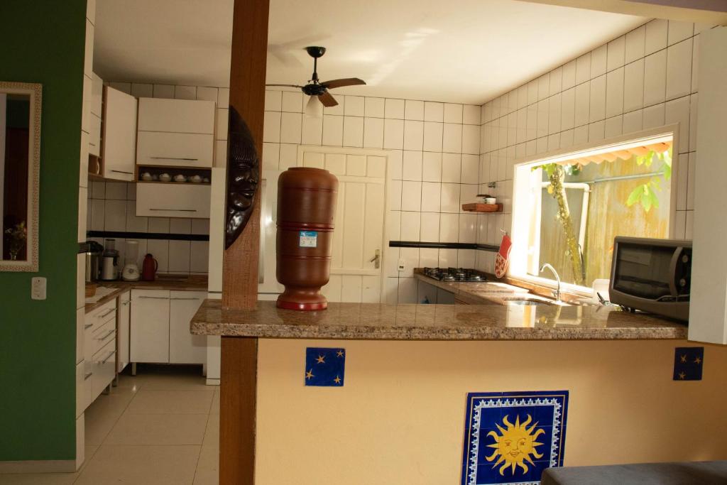 Kuchyň nebo kuchyňský kout v ubytování Hostel Morada do sol Paraty