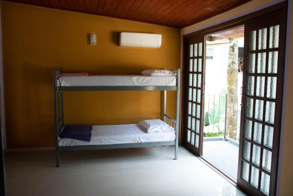 Postel nebo postele na pokoji v ubytování Hostel Morada do sol Paraty