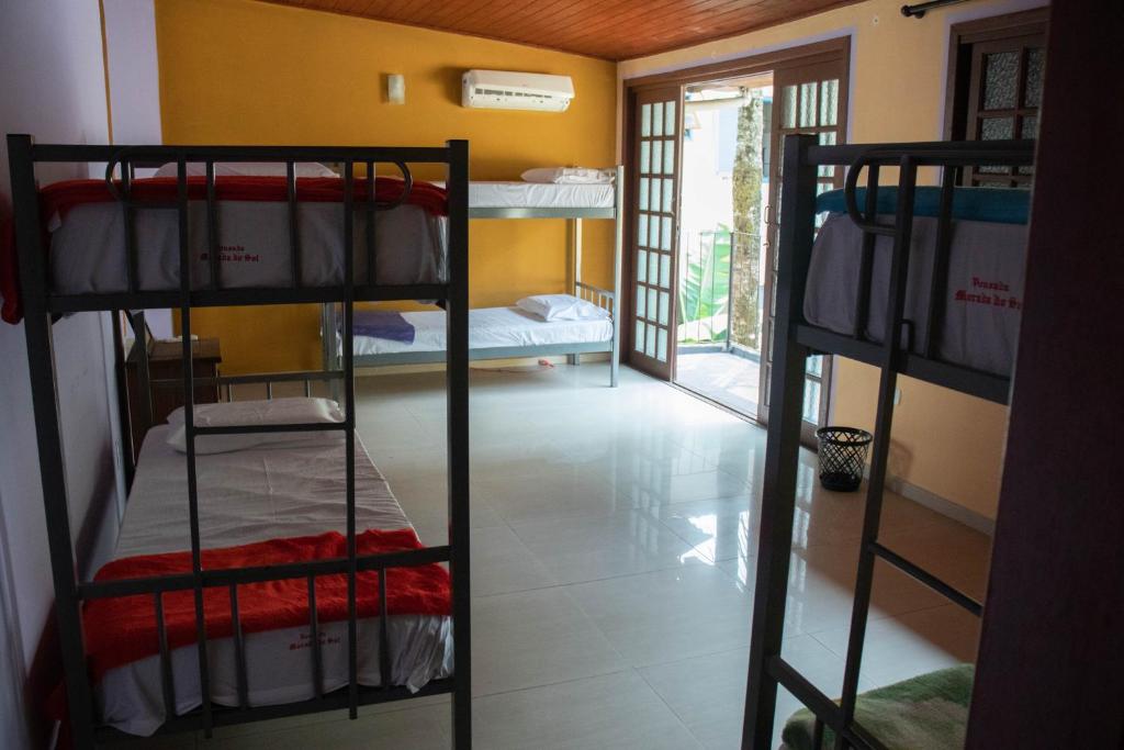 Postel nebo postele na pokoji v ubytování Hostel Morada do sol Paraty