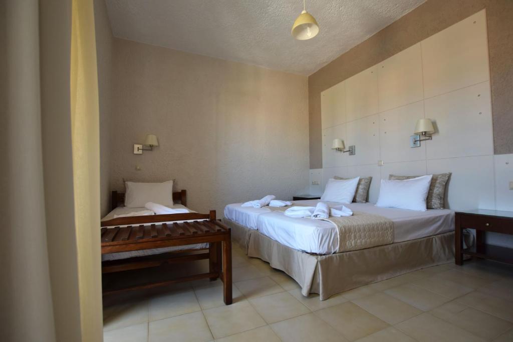 Postel nebo postele na pokoji v ubytování Altis Hotel