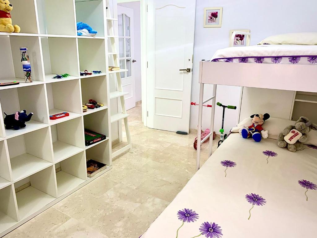 Postel nebo postele na pokoji v ubytování Piso estrella en La Herradura