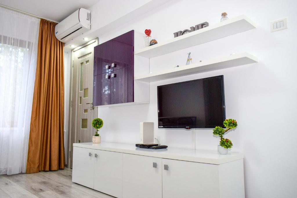 Telewizja i/lub zestaw kina domowego w obiekcie Apartament Black Sea