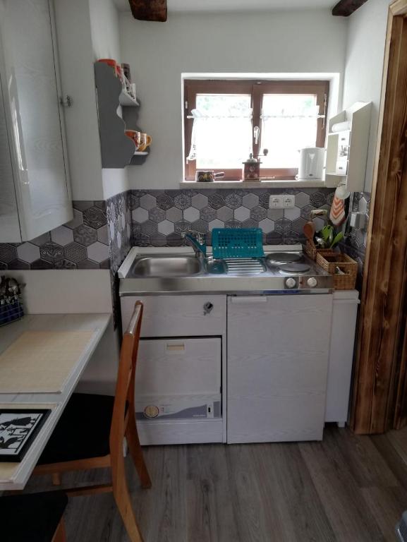 Kuchyň nebo kuchyňský kout v ubytování Ochsenhof