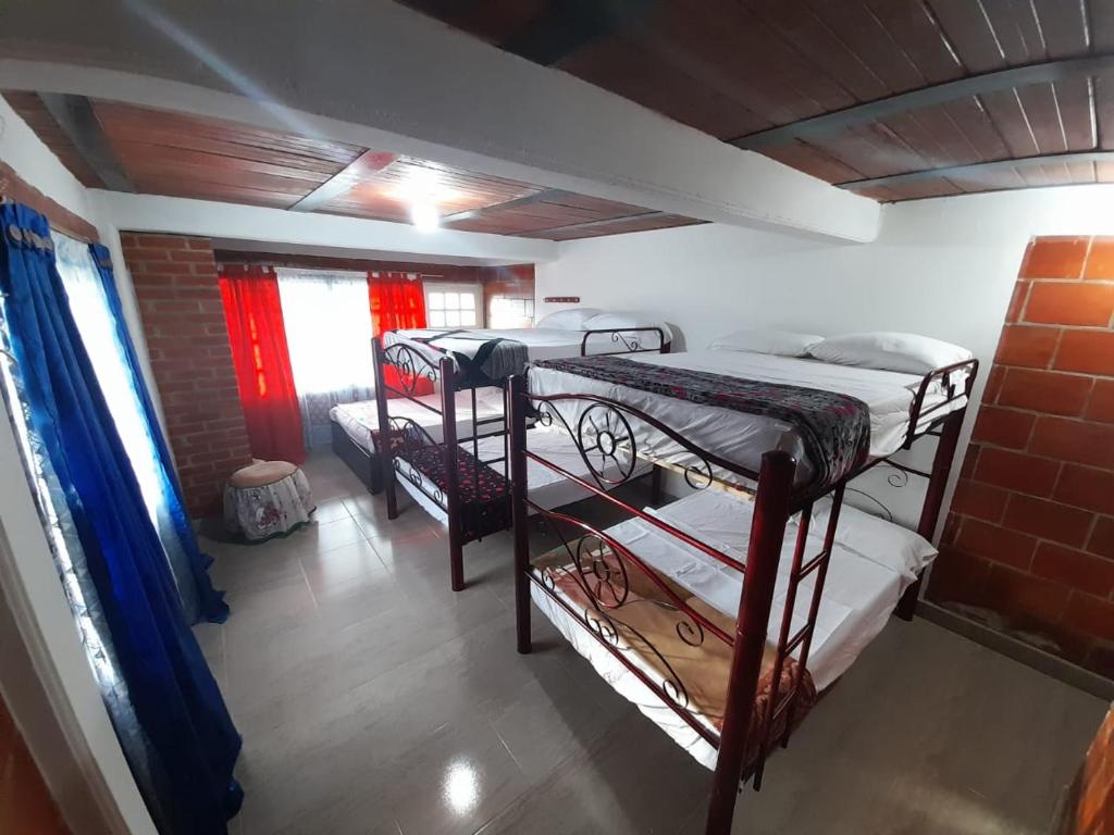 Postel nebo postele na pokoji v ubytování FINCA CORENAS