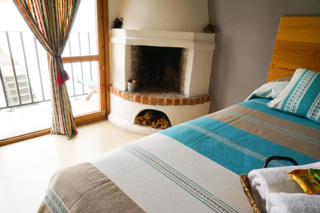 Postel nebo postele na pokoji v ubytování Gaia Guest House