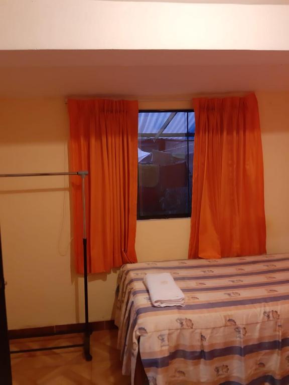 Voodi või voodid majutusasutuse Hostal Ayllu toas