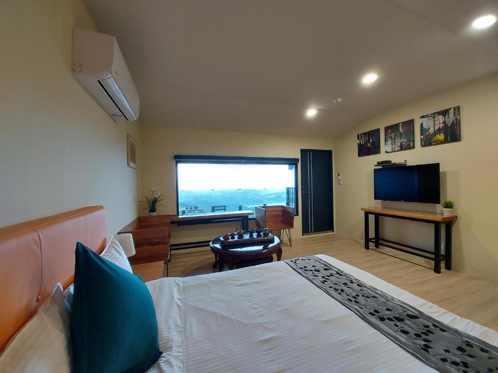 TV a/nebo společenská místnost v ubytování Dosun B&B