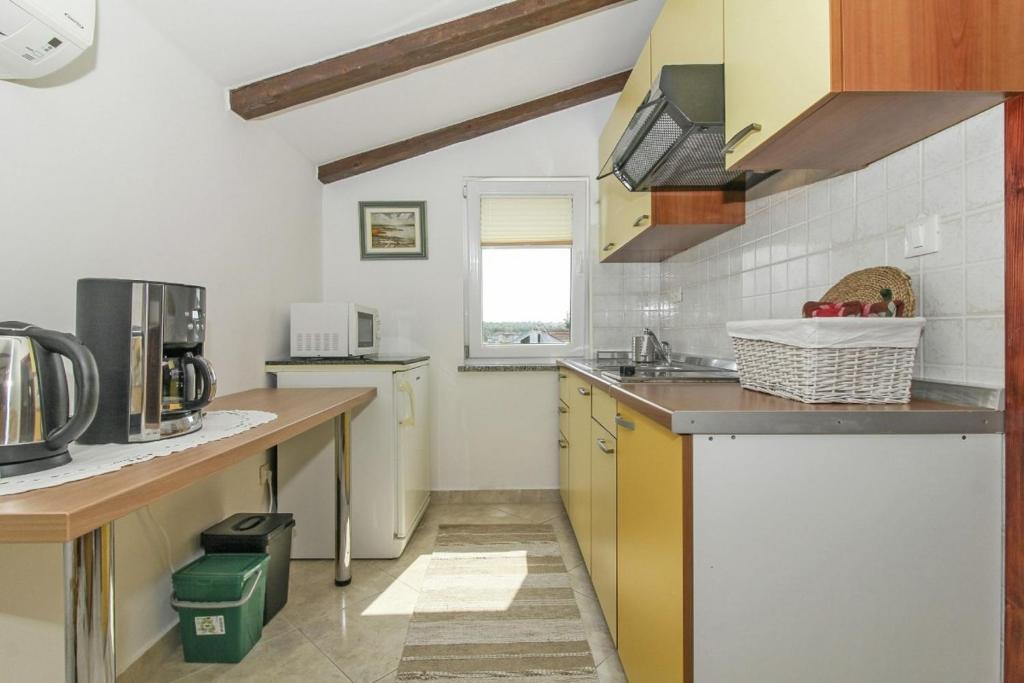Kuchyň nebo kuchyňský kout v ubytování Eva in Poreč * Istrien