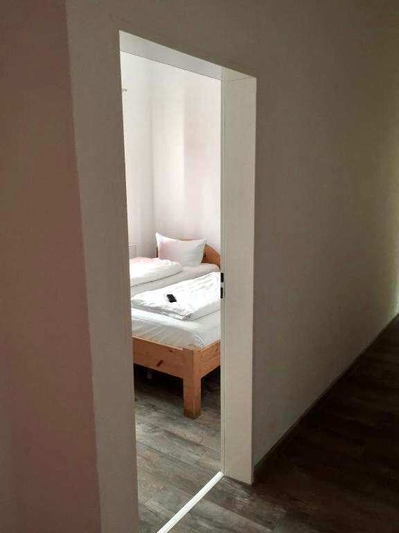 Postel nebo postele na pokoji v ubytování Hotel Sickinger Hof