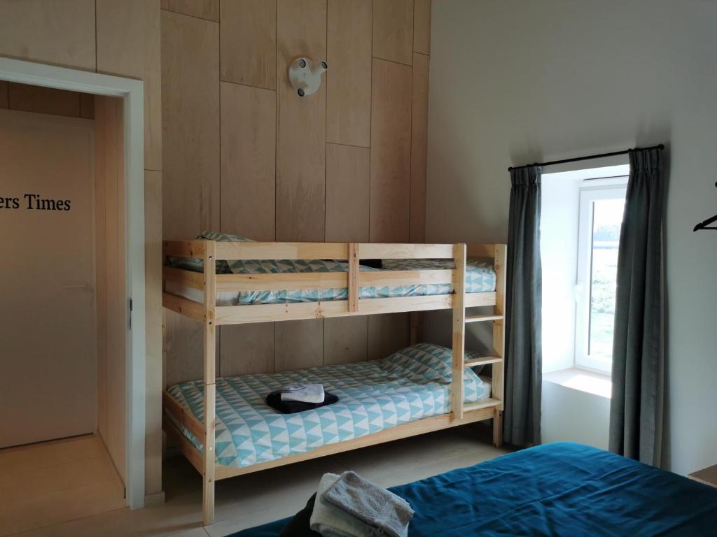 Postel nebo postele na pokoji v ubytování Sint-Sixtus 99