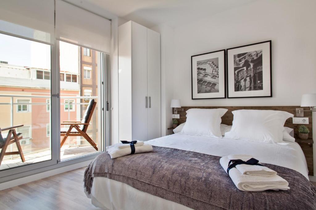 Posteľ alebo postele v izbe v ubytovaní Habitat Apartments Blanca