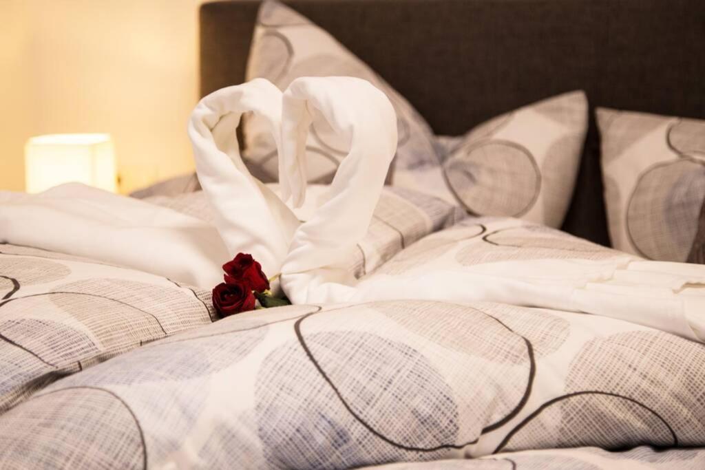 Postel nebo postele na pokoji v ubytování ROCHUS APPARTEMENTS