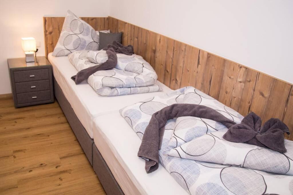 Postel nebo postele na pokoji v ubytování ROCHUS APPARTEMENTS