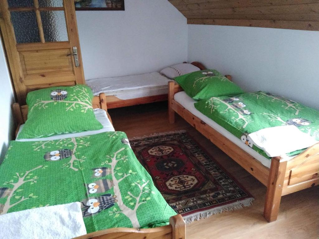 Posteľ alebo postele v izbe v ubytovaní Gospodarstwo Agroturystyczne Nad Zalewem