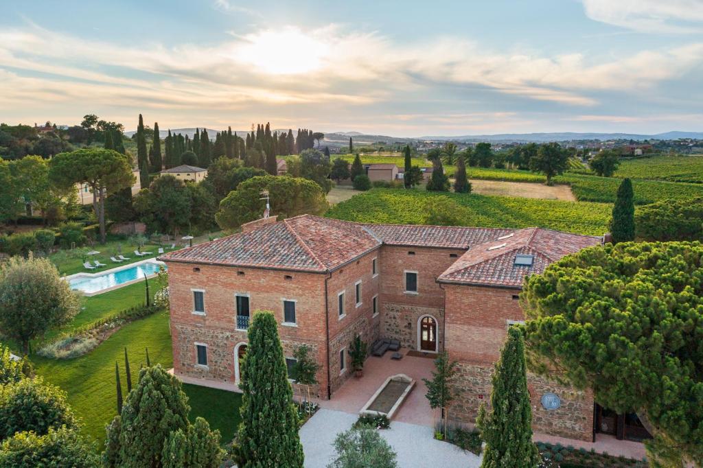 an aerial view of a house with a pool at Villa Svetoni Wine Resort in Montepulciano