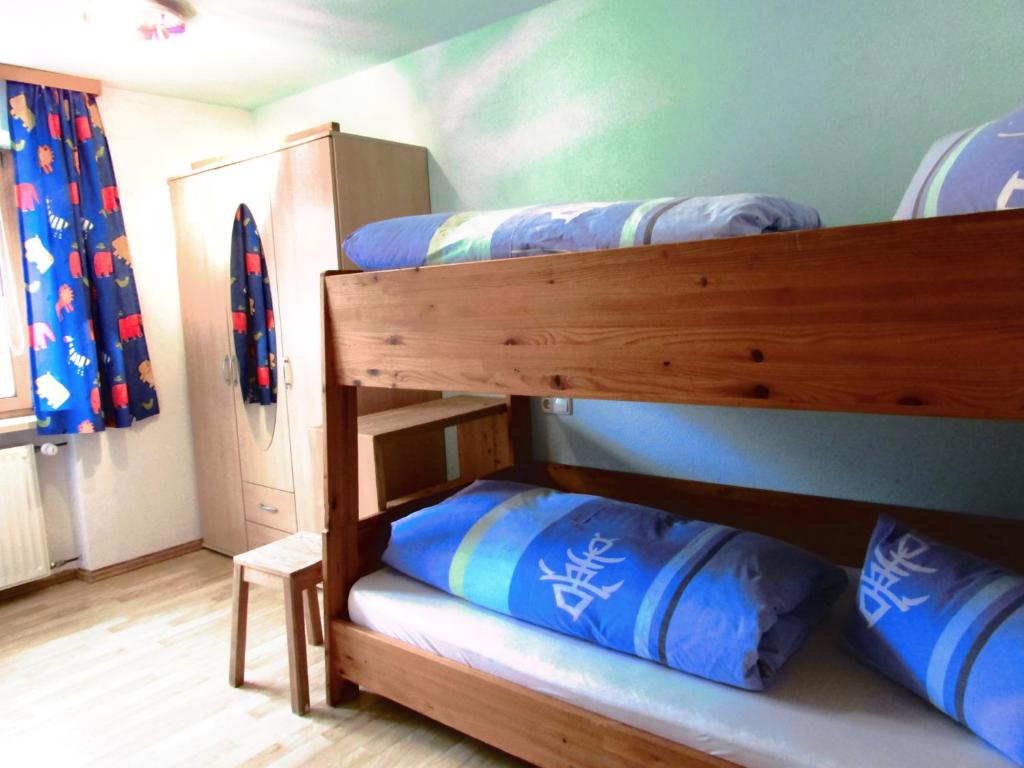 Postel nebo postele na pokoji v ubytování Haus Mittagspitze